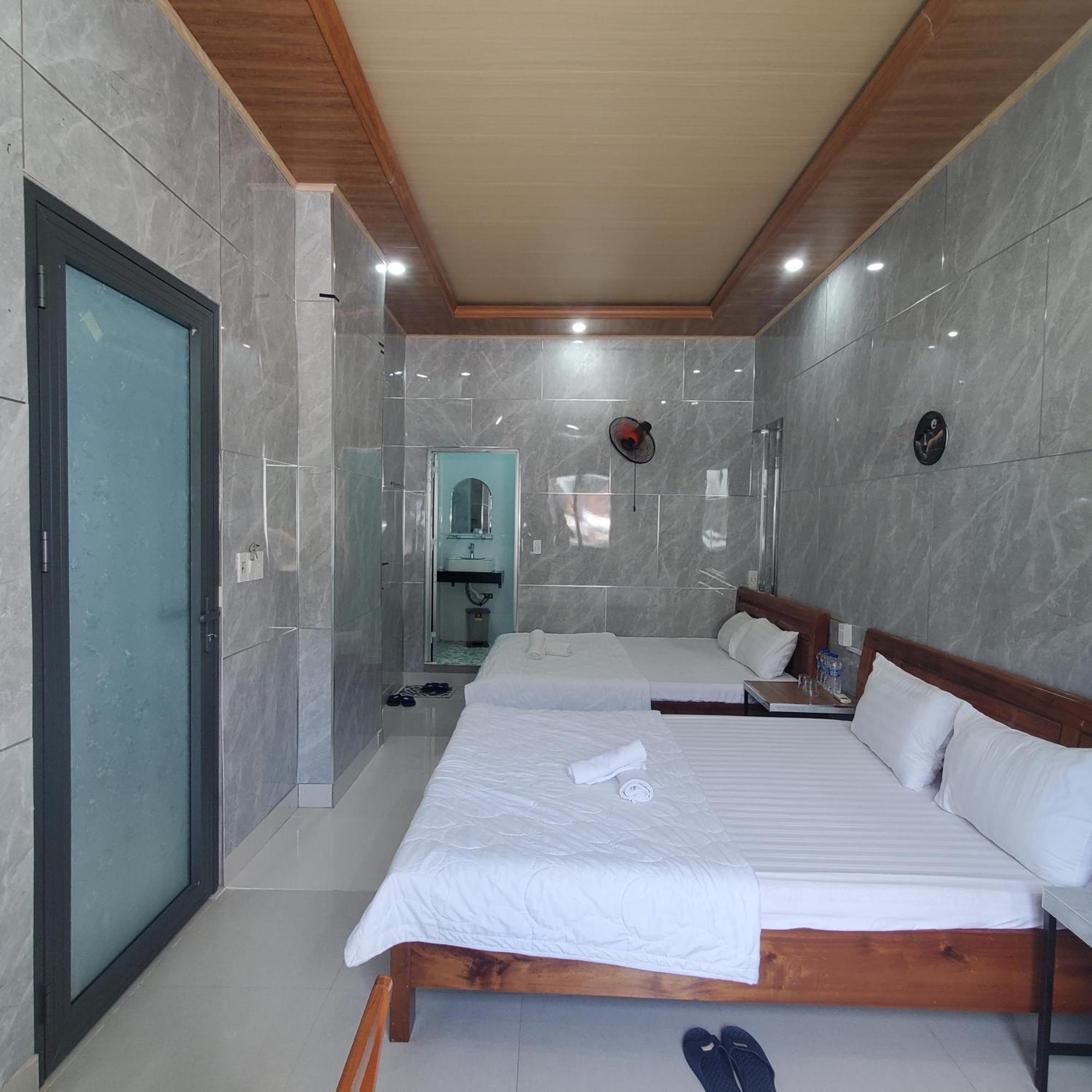 Tuan Thanh Homestay Tân Hiệ Szoba fotó